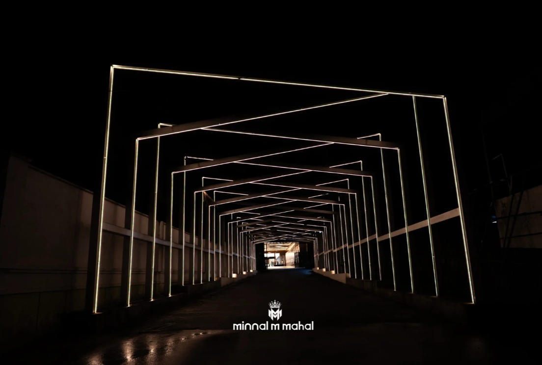 Illuminated entrance walkway at Minnal M Mahal