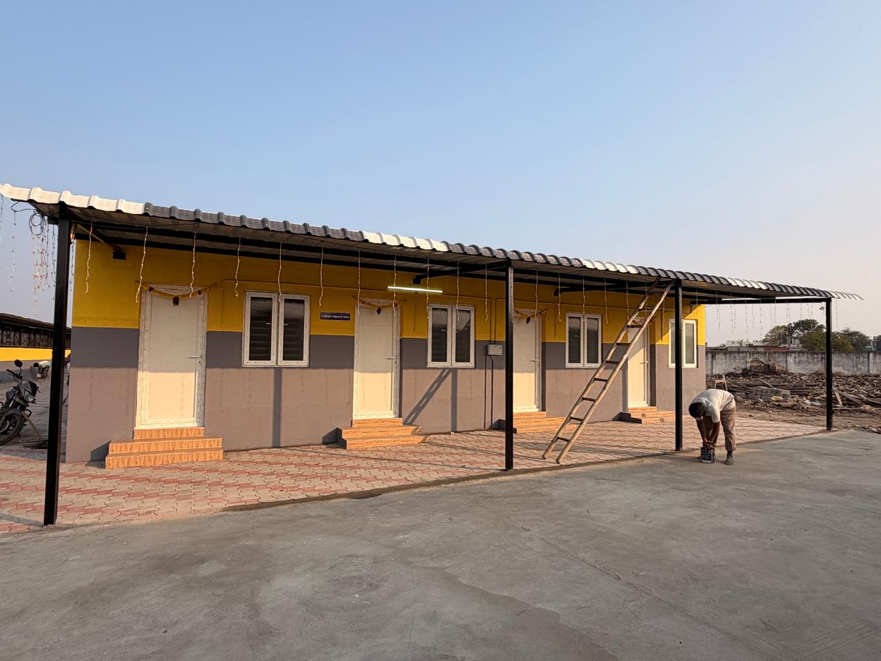 Residential quarters nearing completion, evening view